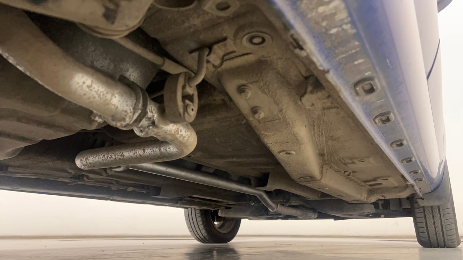 Used 2015 Tata Zest XT Petrol Petrol Manual extra REAR RIGHT UNDERBODY VIEW