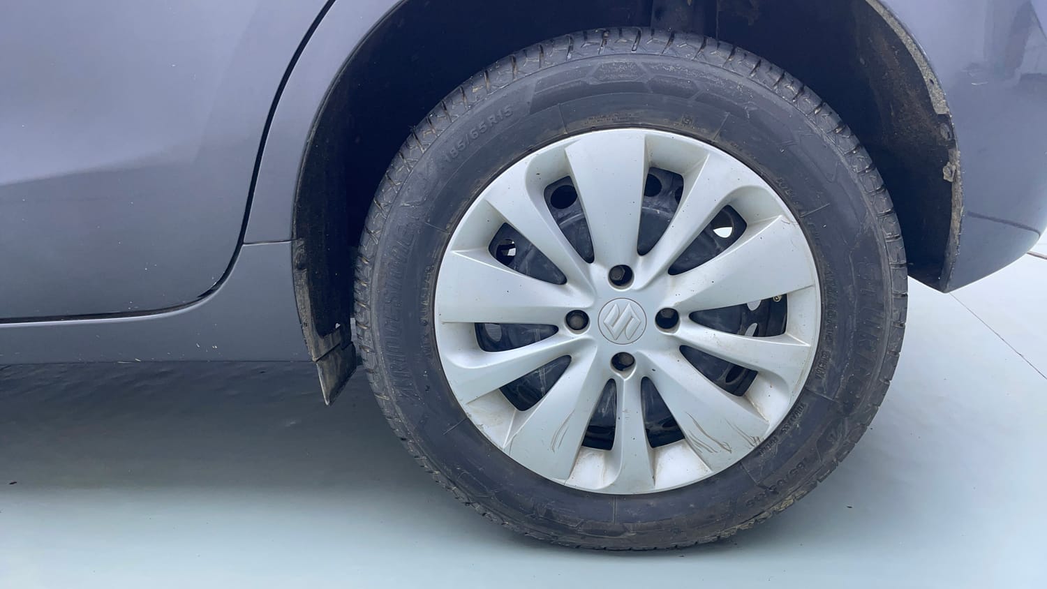 Used 2016 Maruti Suzuki Baleno Delta 1.2 Petrol Manual tyres LEFT REAR TYRE RIM VIEW