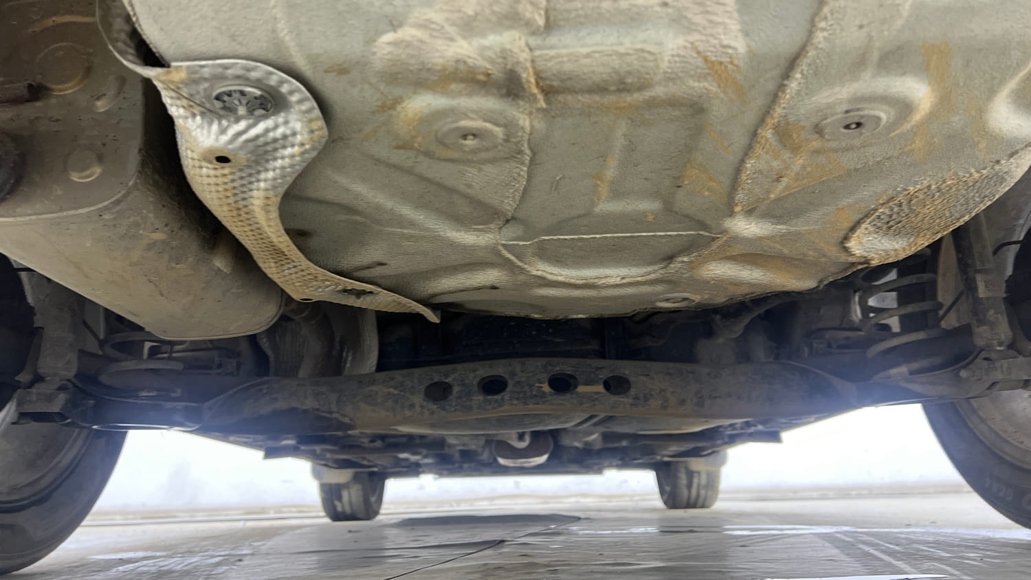 Used 2023 Skoda Slavia Ambition 1.0L TSI AT Petrol Automatic extra REAR UNDERBODY VIEW (TAKEN FROM REAR)