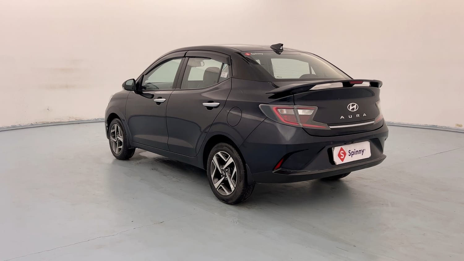 Used 2023 Hyundai Aura SX 1.2 (O) Petrol Petrol Manual exterior LEFT REAR CORNER VIEW