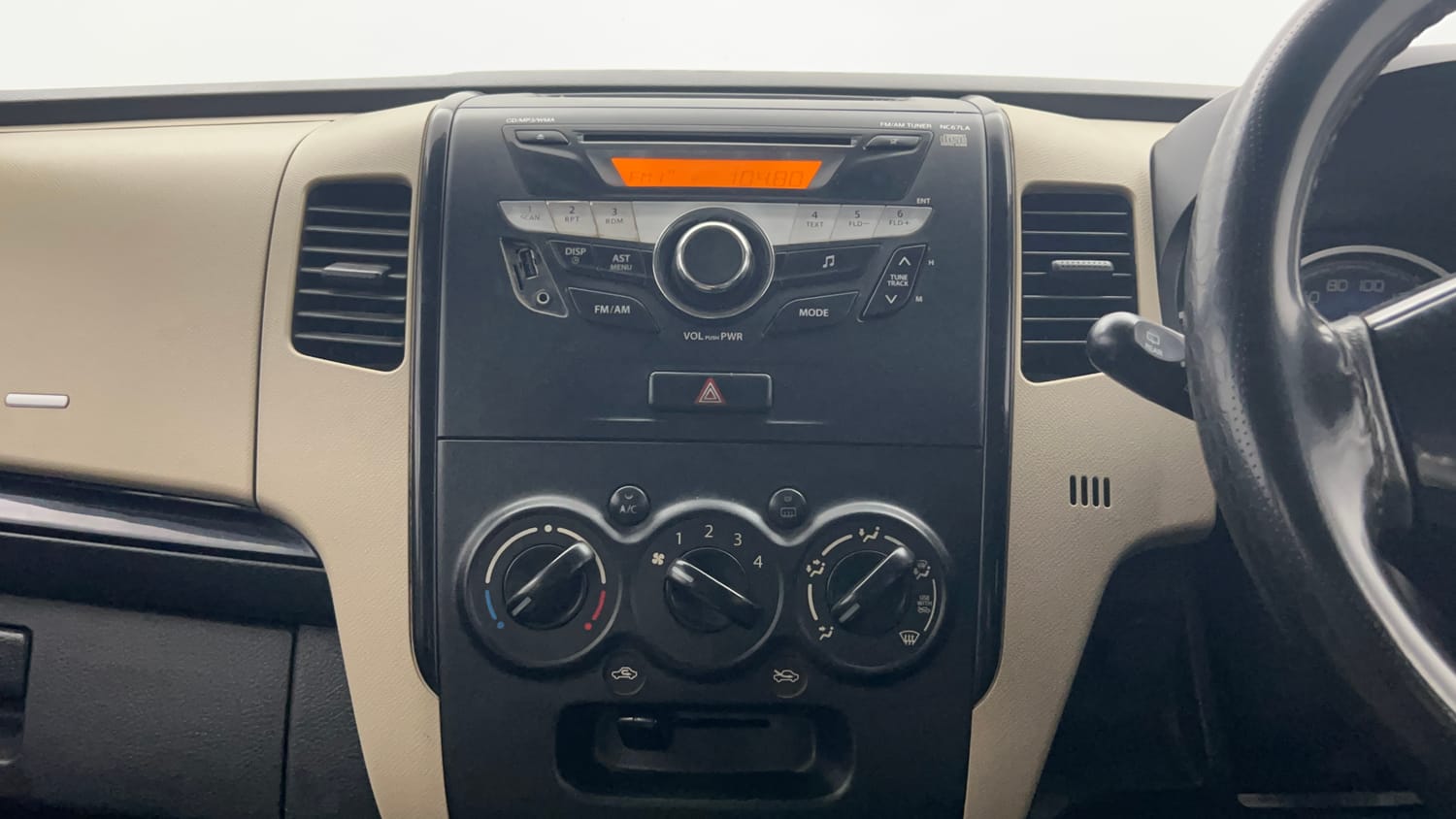 Used 2018 Maruti Suzuki Wagon R VXI Petrol Manual top_features Integrated (in-dash) music system