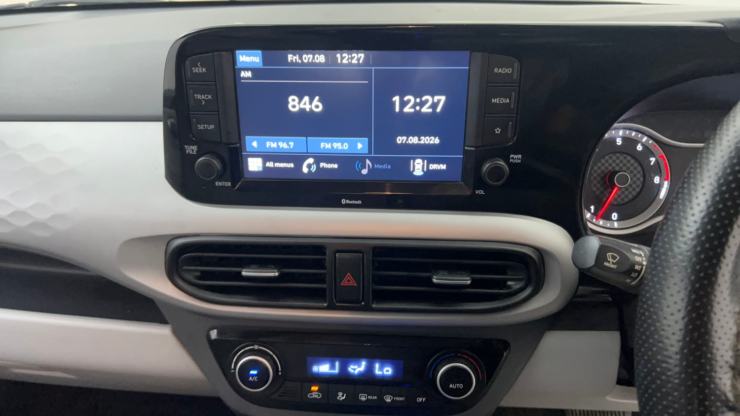 Used 2021 Hyundai Grand i10 Nios Sportz AMT 1.2 Kappa VTVT Petrol Automatic top_features Integrated (in-dash) music system