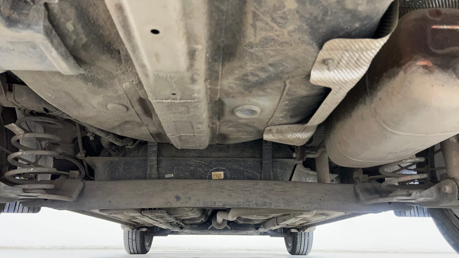 Used 2023 Hyundai Aura SX 1.2 CNG Cng Manual extra REAR UNDERBODY VIEW (TAKEN FROM REAR)