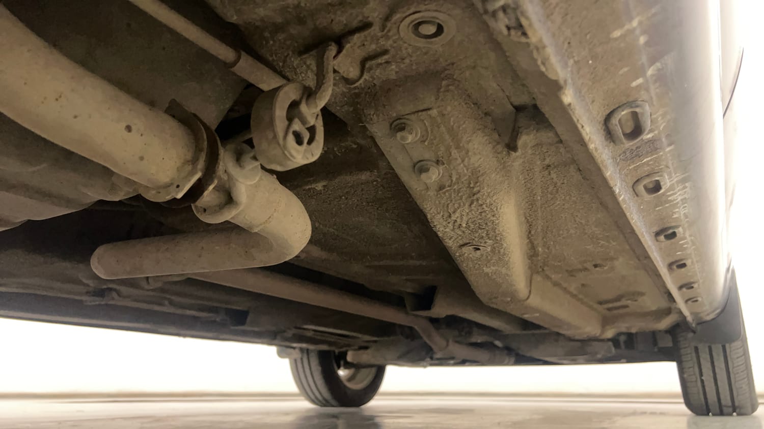 Used 2015 Tata Zest XT Petrol Petrol Manual extra REAR RIGHT UNDERBODY VIEW