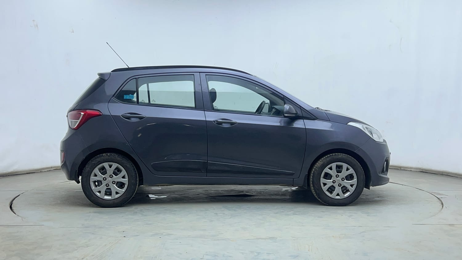 Used 2015 Hyundai Grand i10 Sportz 1.2 Kappa VTVT Petrol Manual exterior RIGHT SIDE VIEW