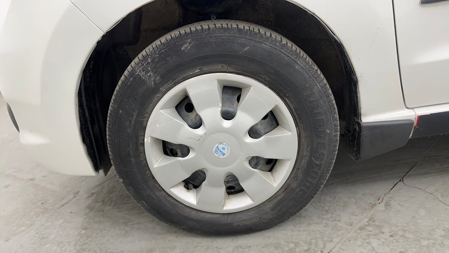 Used 2013 Maruti Suzuki A-Star VXI Petrol Manual tyres LEFT FRONT TYRE RIM VIEW