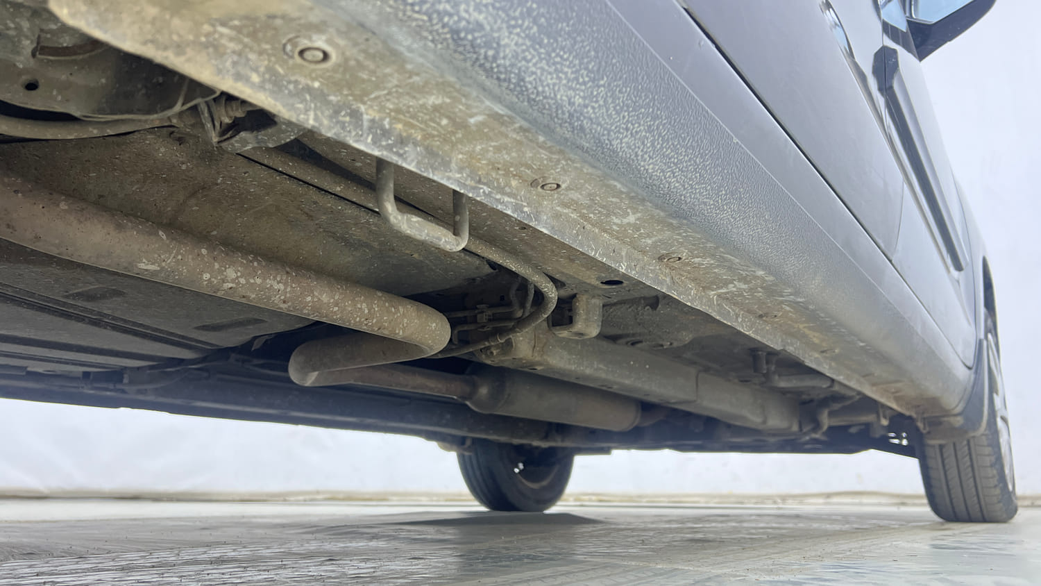 Used 2013 Maruti Suzuki Ertiga Vxi Petrol Manual extra REAR RIGHT UNDERBODY VIEW