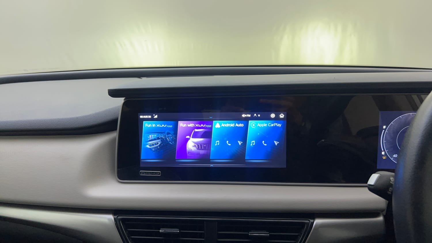 Used 2024 Mahindra XUV700 AX 5 Petrol AT 5 STR Petrol Automatic top_features Integrated (in-dash) music system