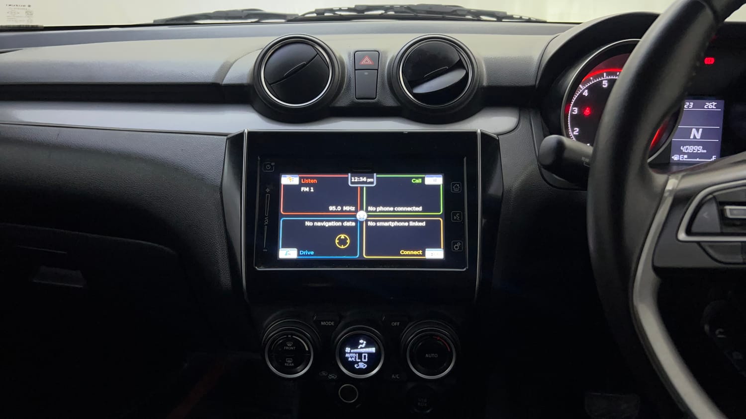 Used 2018 Maruti Suzuki Swift ZXi AMT Petrol Automatic top_features Integrated (in-dash) music system