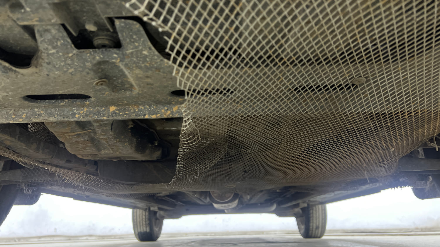 Used 2025 Nissan Magnite Tekna Plus HRAO 1.0 Turbo Petrol MT Petrol Manual extra FRONT LEFT UNDERBODY VIEW