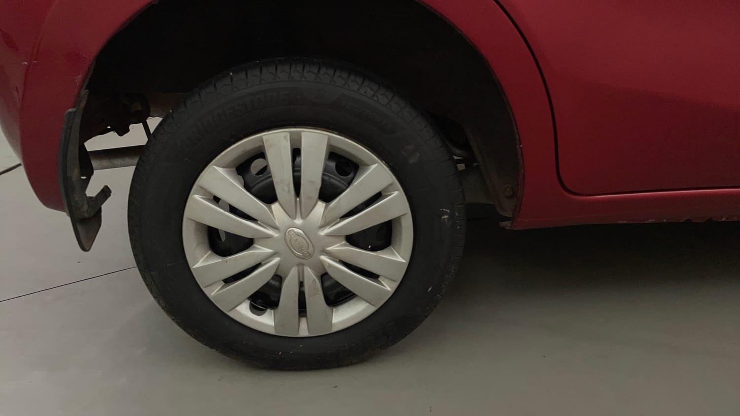 Used 2014 Datsun GO T Petrol Manual tyres RIGHT REAR TYRE RIM VIEW