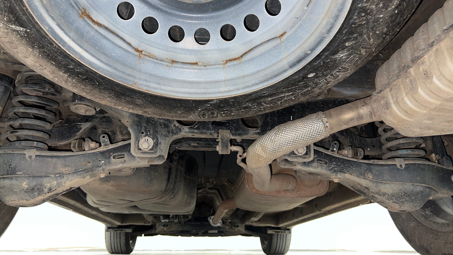 Used 2024 Mahindra XUV700 AX 5 Petrol AT 5 STR Petrol Automatic extra REAR UNDERBODY VIEW (TAKEN FROM REAR)
