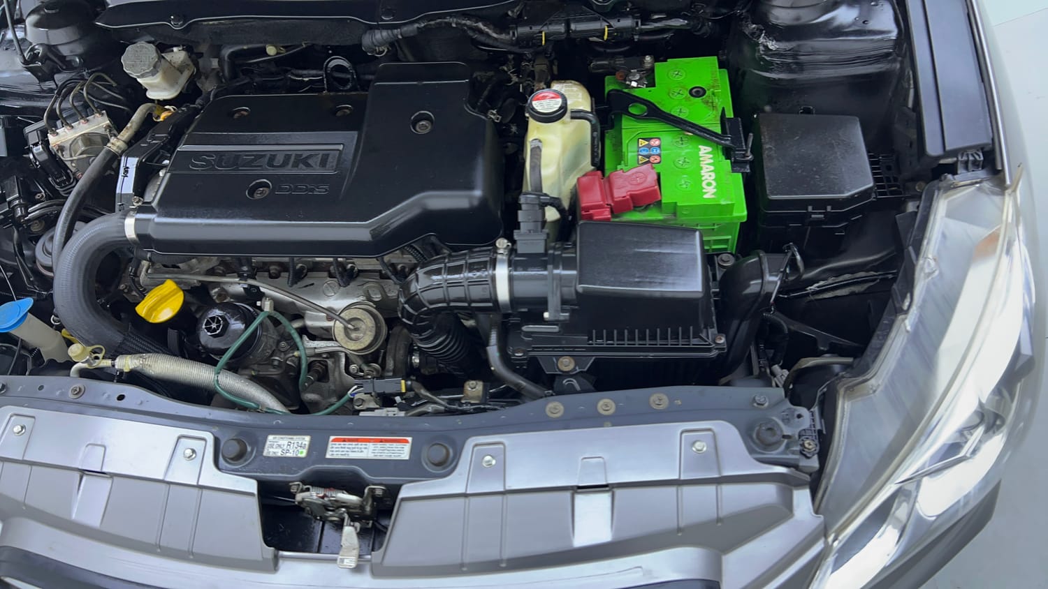 Used 2017 Maruti Suzuki Ciaz Zeta 1.3 Hybrid Diesel Manual engine ENGINE LEFT SIDE VIEW