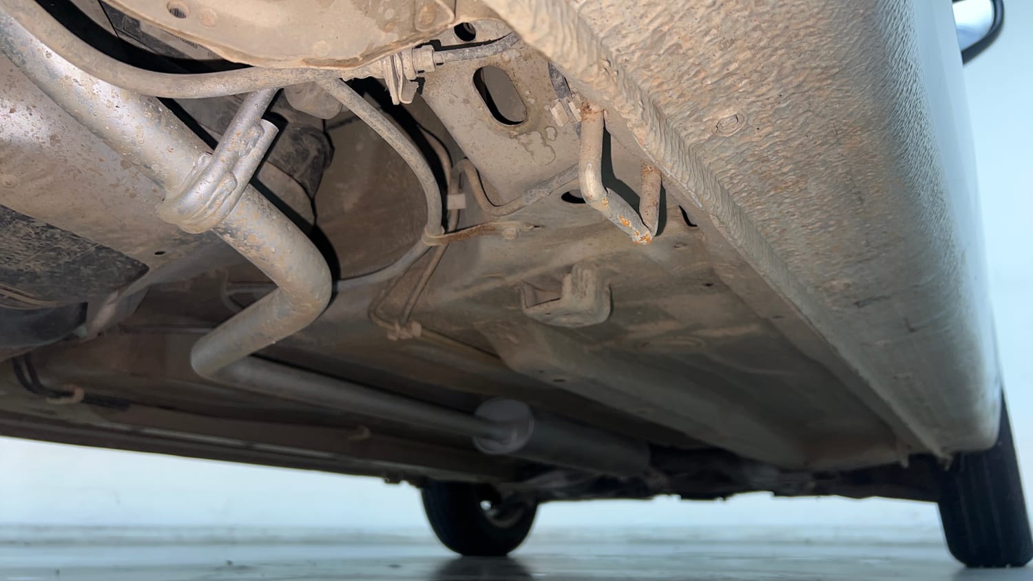 Used 2014 Maruti Suzuki Celerio VXi AMT Petrol Automatic extra REAR RIGHT UNDERBODY VIEW