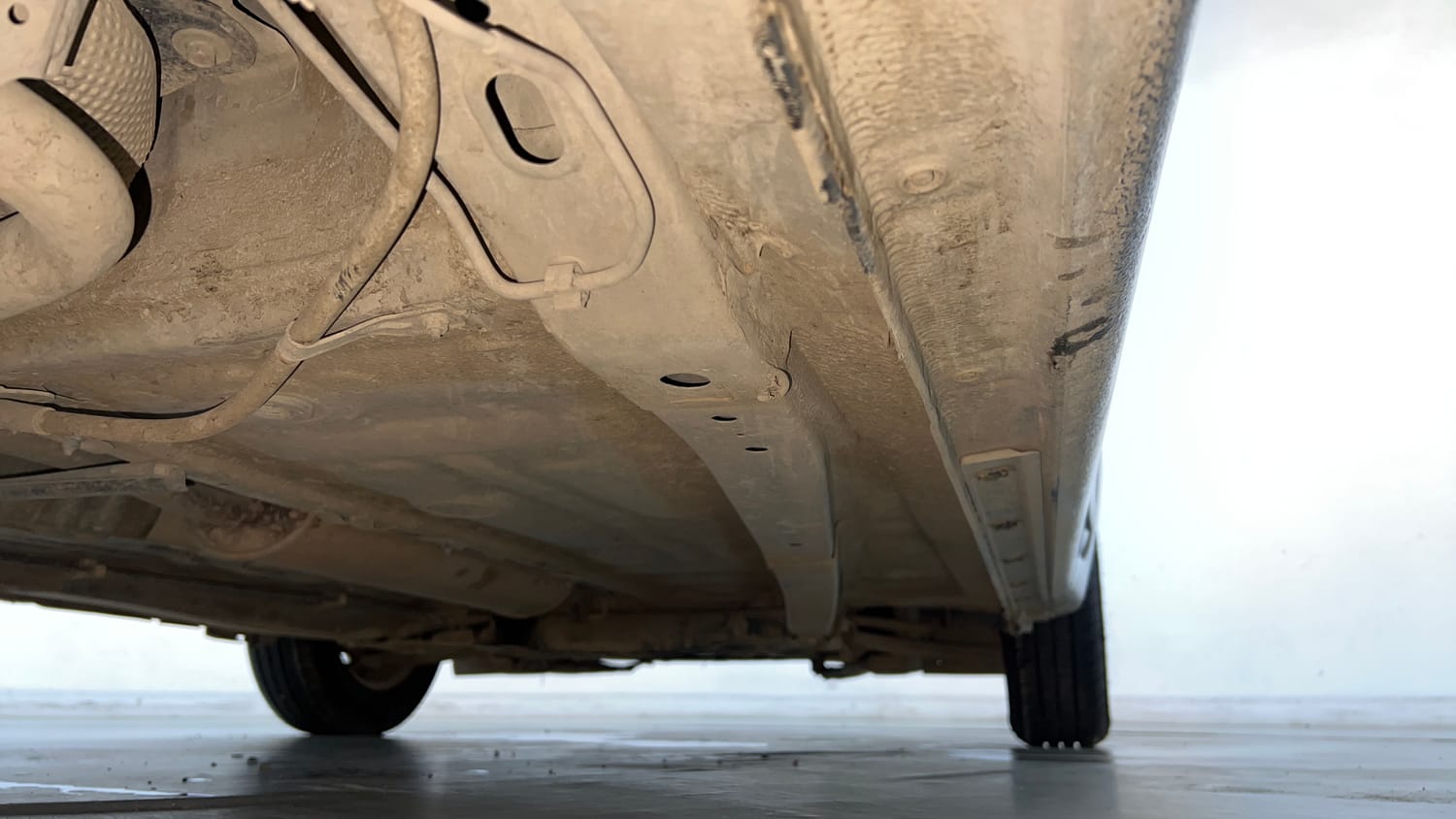 Used 2020 Maruti Suzuki Dzire VXi Petrol Manual extra REAR RIGHT UNDERBODY VIEW