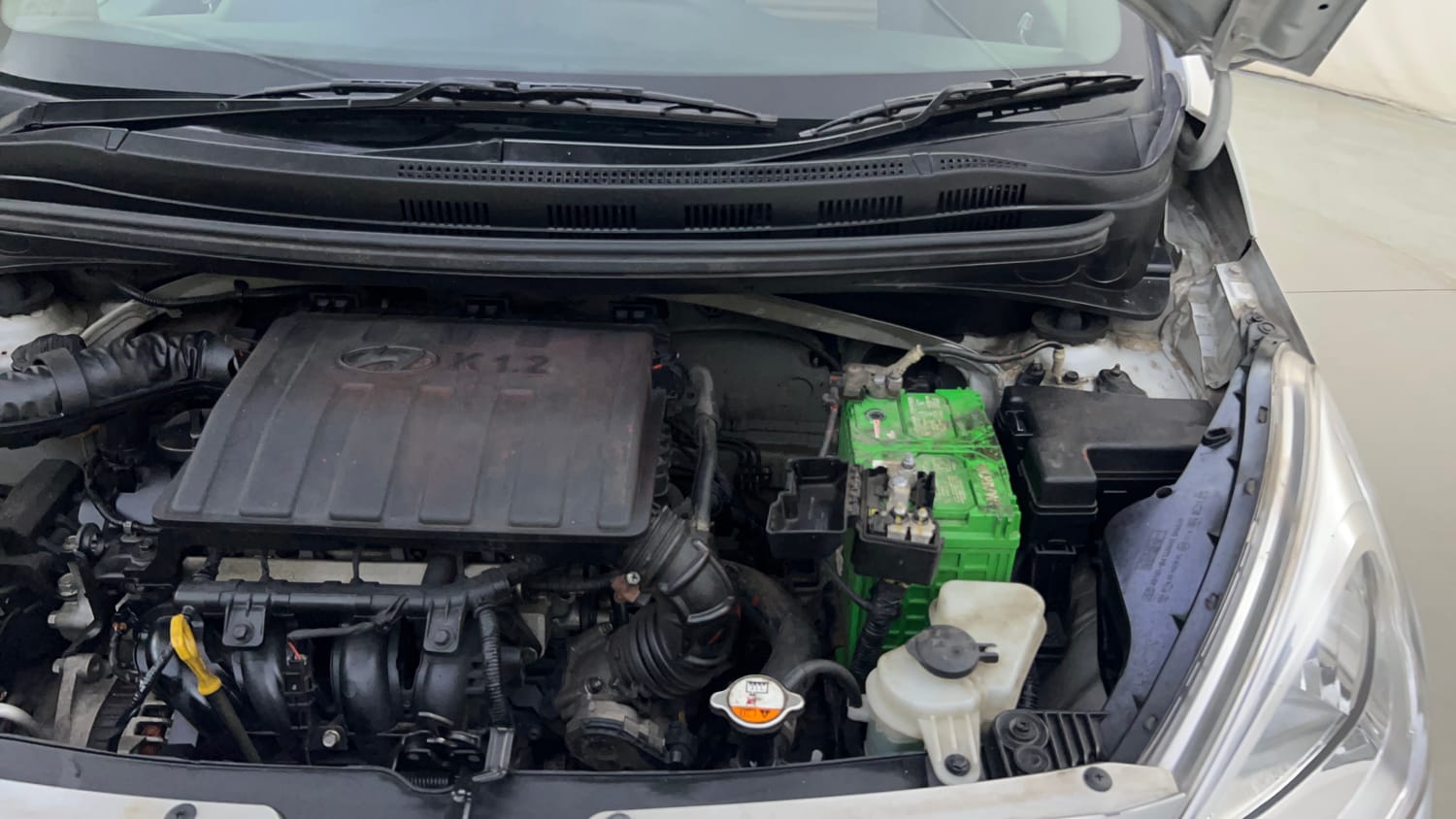 Used 2017 Hyundai Grand i10 Sportz 1.2 Kappa VTVT Petrol Manual engine ENGINE LEFT SIDE HINGE & APRON VIEW