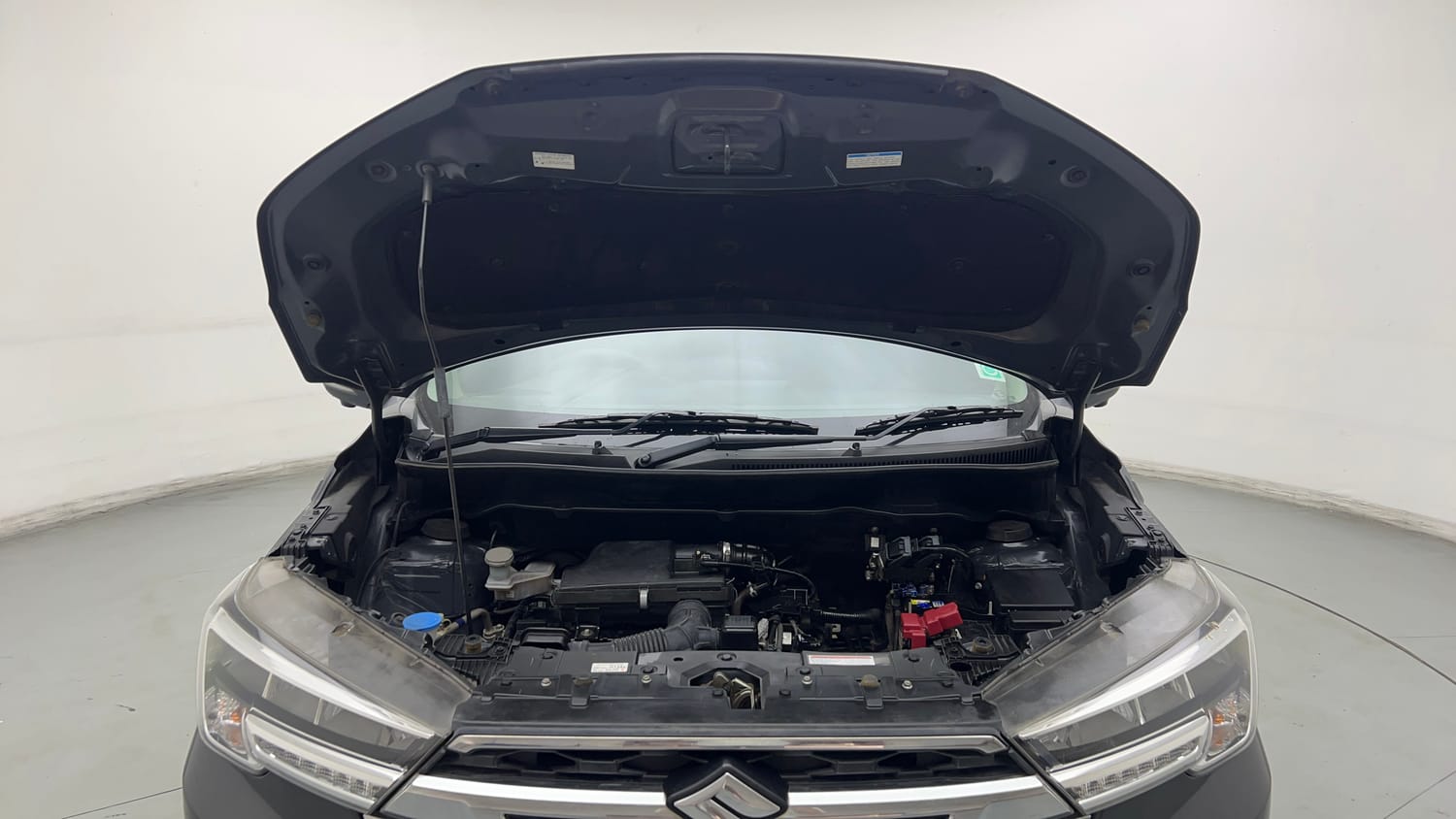 Used 2024 Maruti Suzuki XL6 Alpha AT Petrol Petrol Automatic engine ENGINE & BONNET OPEN FRONT VIEW
