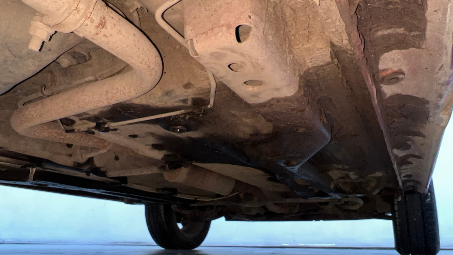 Used 2019 Tata Tiago XZ+ Petrol+cng(outside fitted) Cng Manual extra REAR RIGHT UNDERBODY VIEW