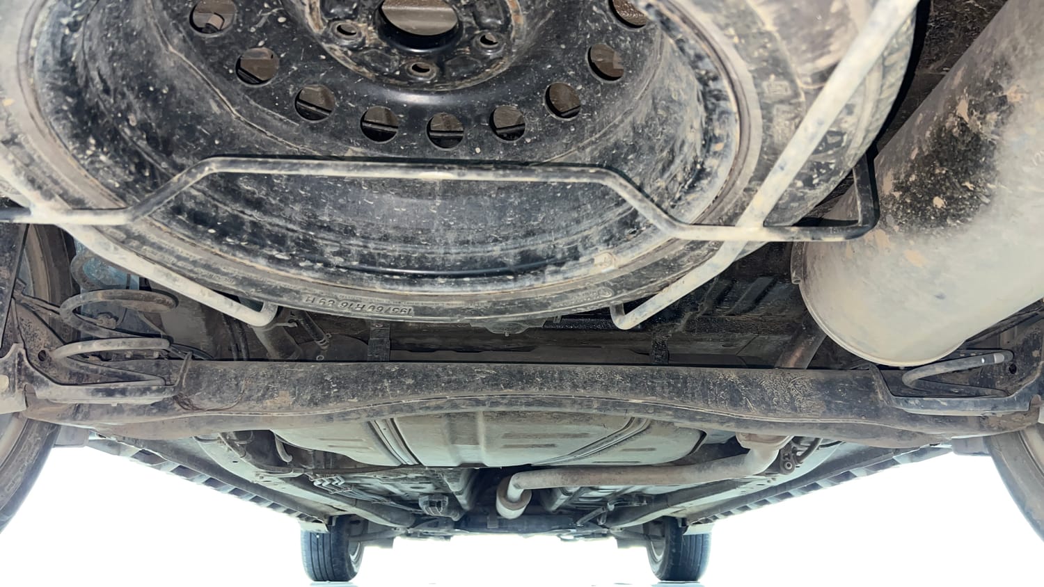 Used 2024 Maruti Suzuki XL6 Alpha AT Petrol Petrol Automatic extra REAR UNDERBODY VIEW (TAKEN FROM REAR)