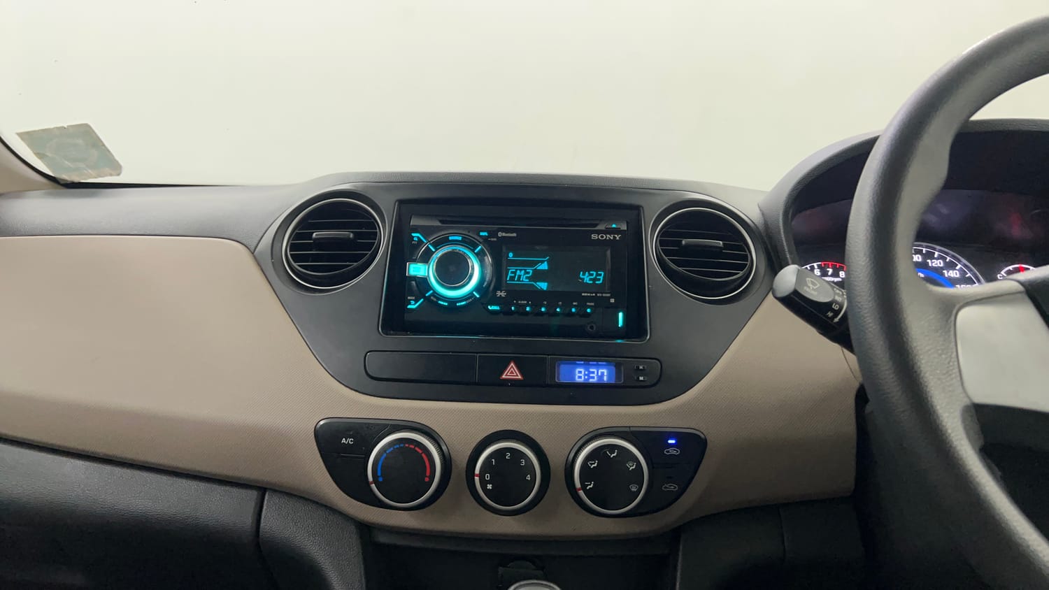 Used 2016 Hyundai Grand i10 Magna AT 1.2 Kappa VTVT Petrol Automatic interior MUSIC SYSTEM & AC CONTROL VIEW