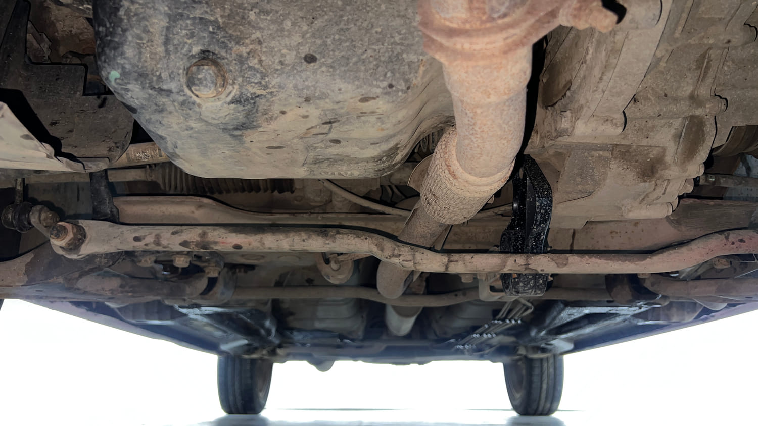 Used 2019 Tata Tiago XZ+ Petrol+cng(outside fitted) Cng Manual extra FRONT LEFT UNDERBODY VIEW