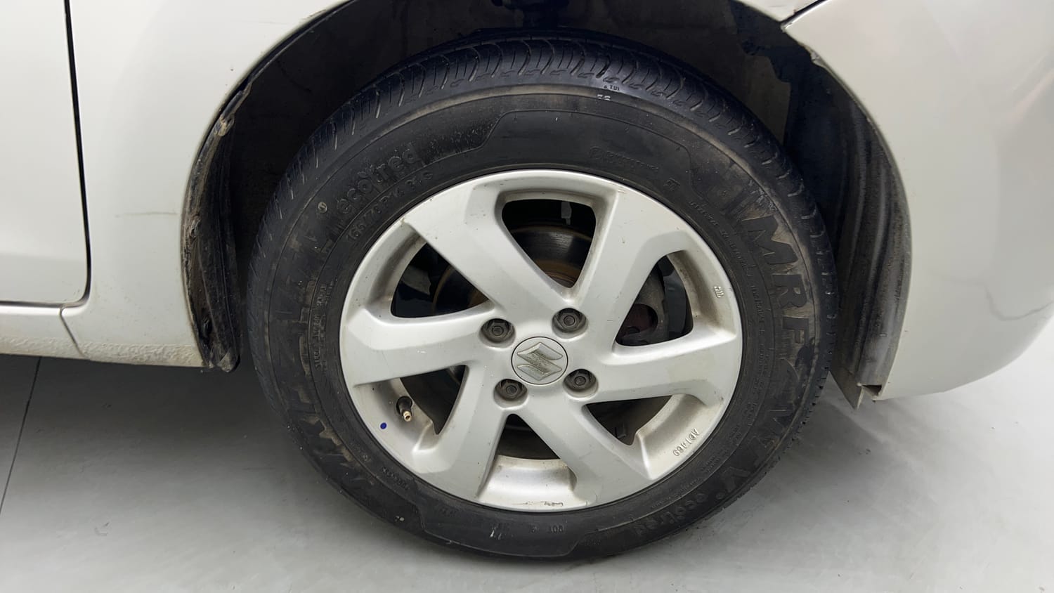 Used 2014 Maruti Suzuki Celerio VXi AMT Petrol Automatic tyres RIGHT FRONT TYRE RIM VIEW