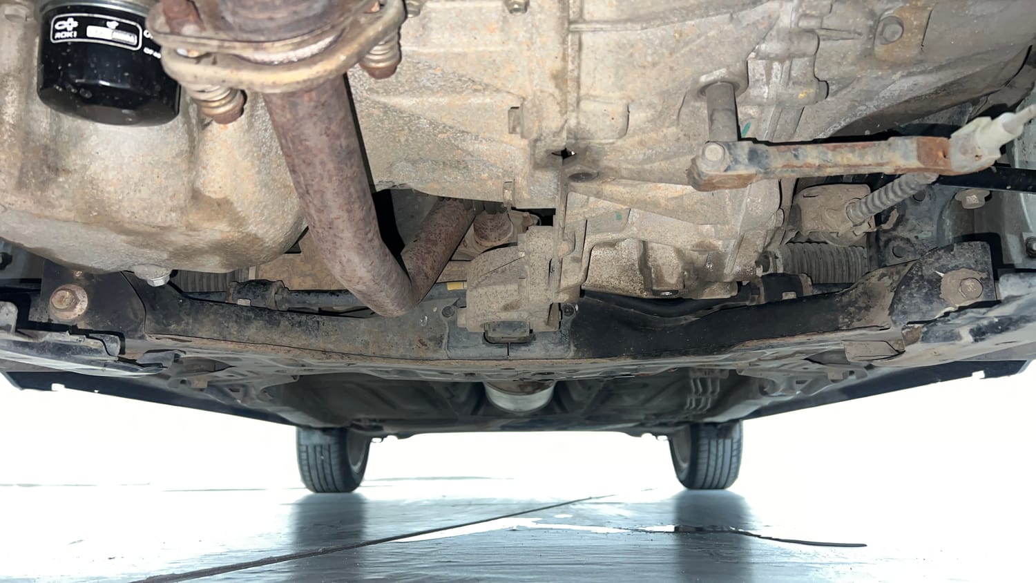 Used 2016 Maruti Suzuki Baleno Zeta 1.2 Petrol Manual extra FRONT LEFT UNDERBODY VIEW