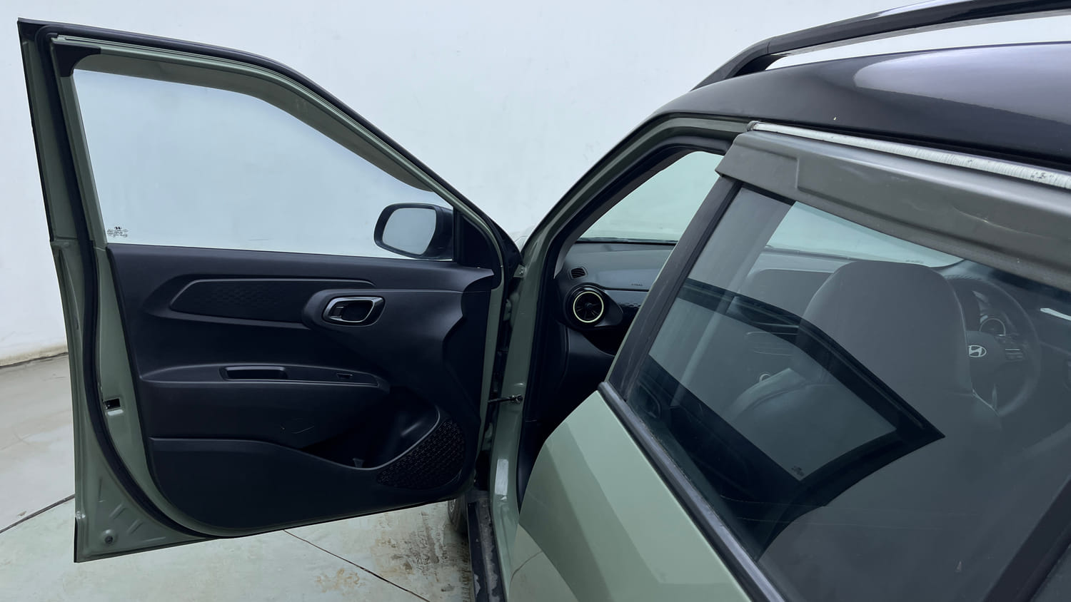 Used 2023 Hyundai Exter SX (O) Connect 1.2 AMT Dual Tone Petrol Automatic interior LEFT FRONT DOOR OPEN VIEW