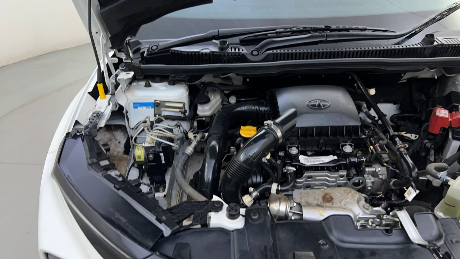 Used 2024 Tata Nexon Fearless 1.2 Revotron Petrol 6MT DT Petrol Manual engine ENGINE RIGHT SIDE HINGE & APRON VIEW