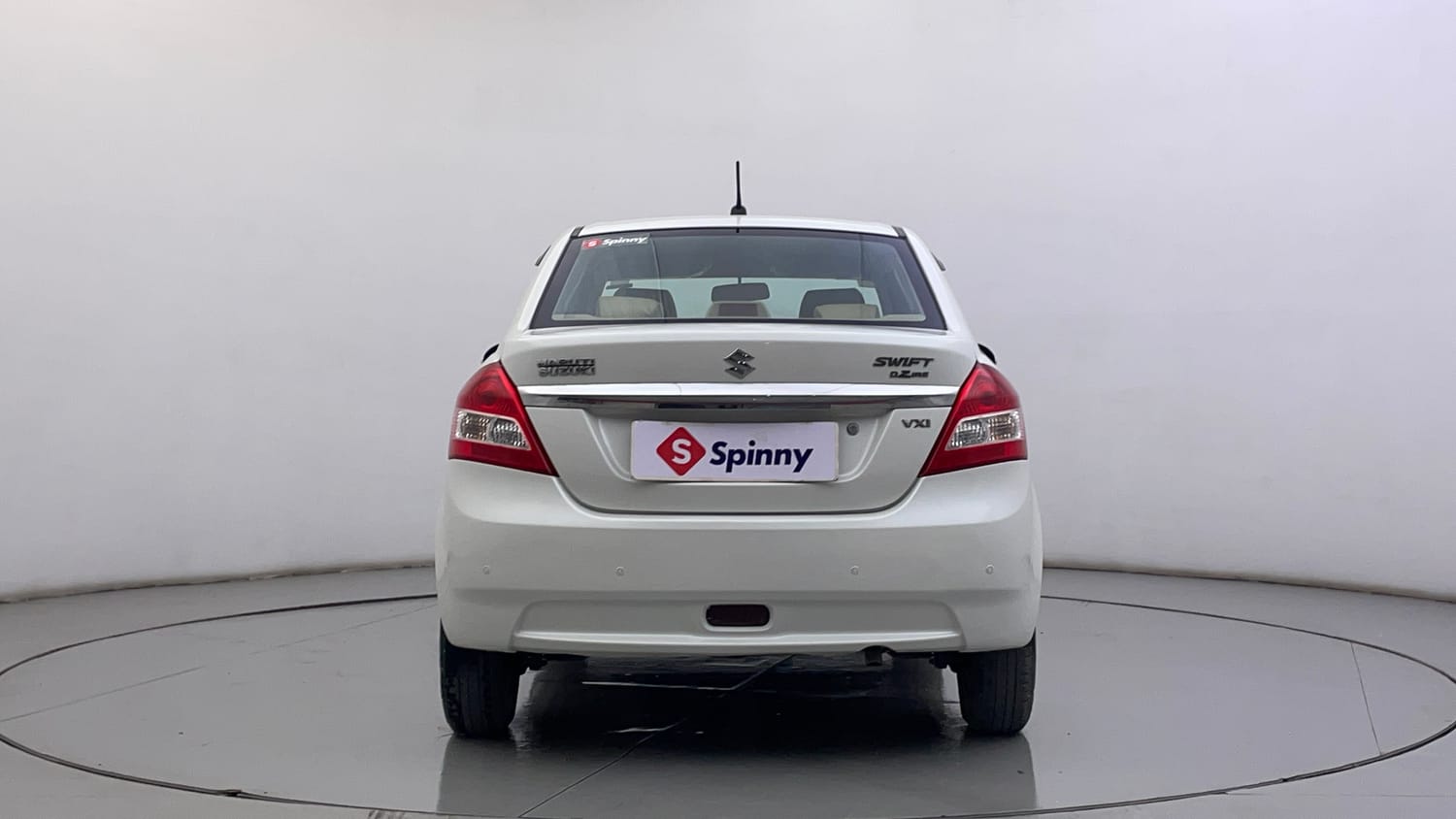 Used 2013 Maruti Suzuki Swift Dzire VXI Petrol Manual exterior BACK VIEW