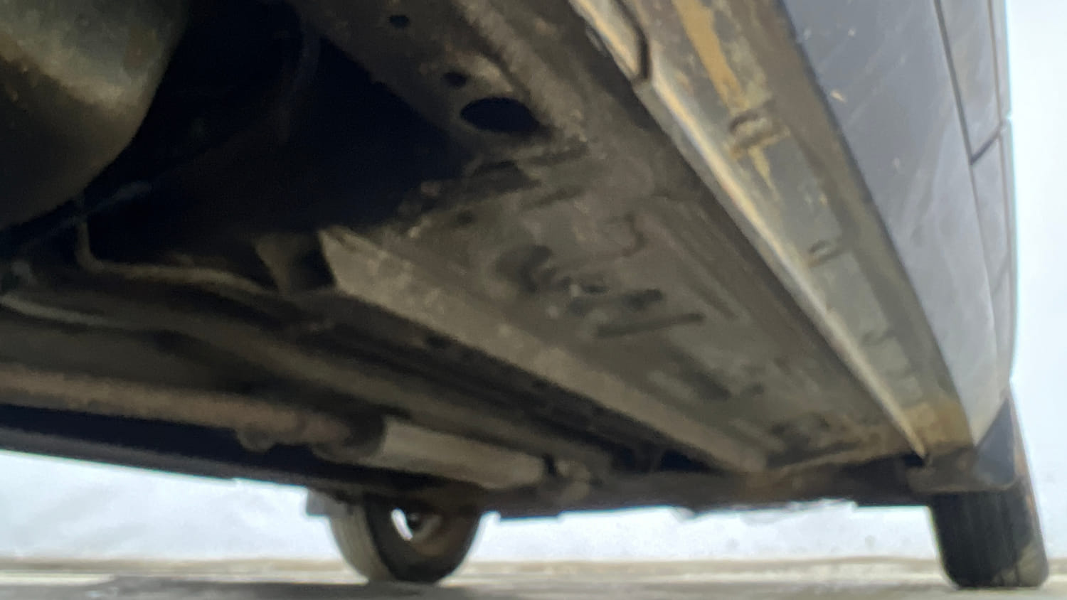 Used 2025 Nissan Magnite Tekna Plus HRAO 1.0 Turbo Petrol MT Petrol Manual extra REAR RIGHT UNDERBODY VIEW