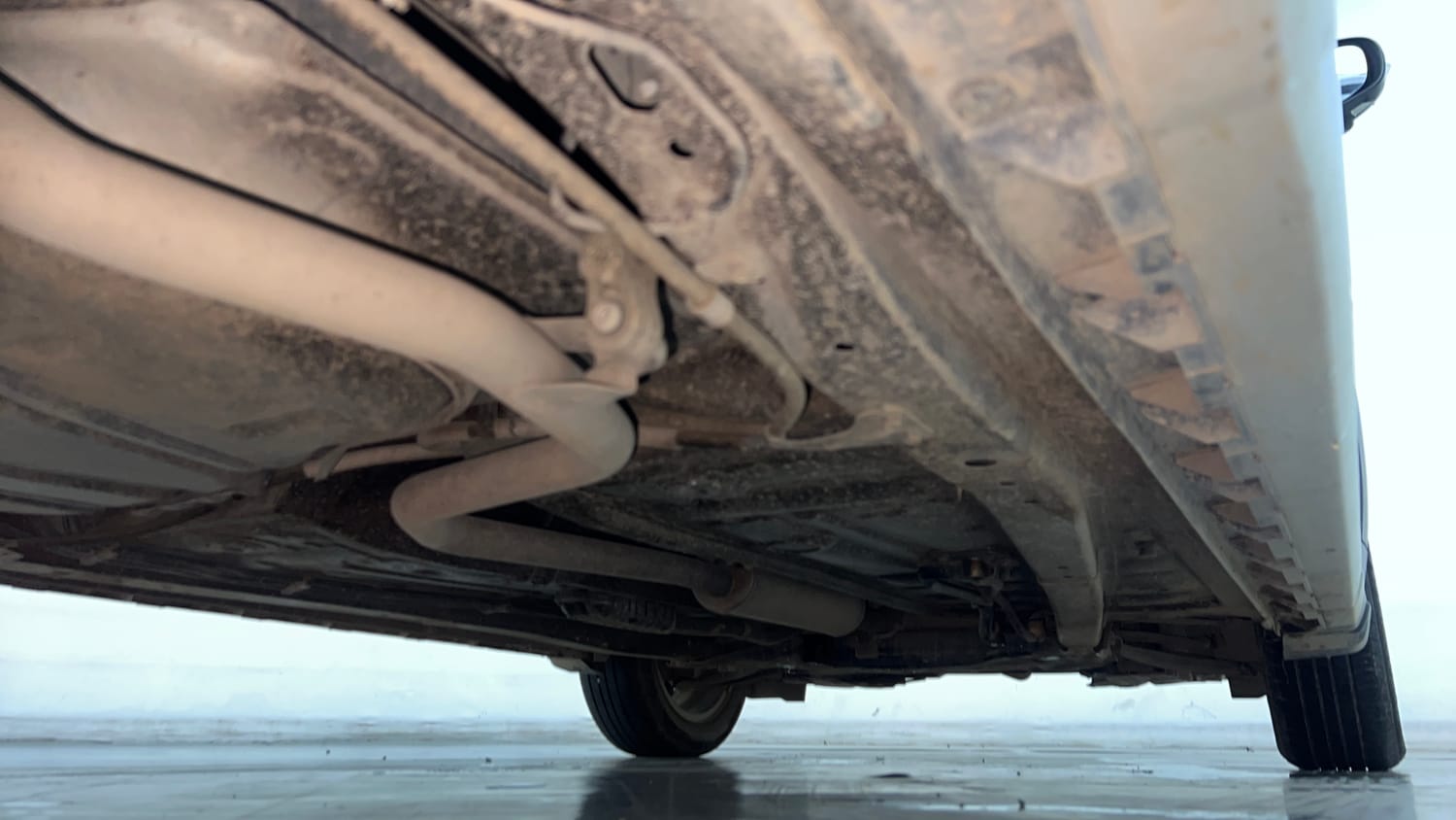 Used 2024 Maruti Suzuki XL6 Alpha AT Petrol Petrol Automatic extra REAR RIGHT UNDERBODY VIEW