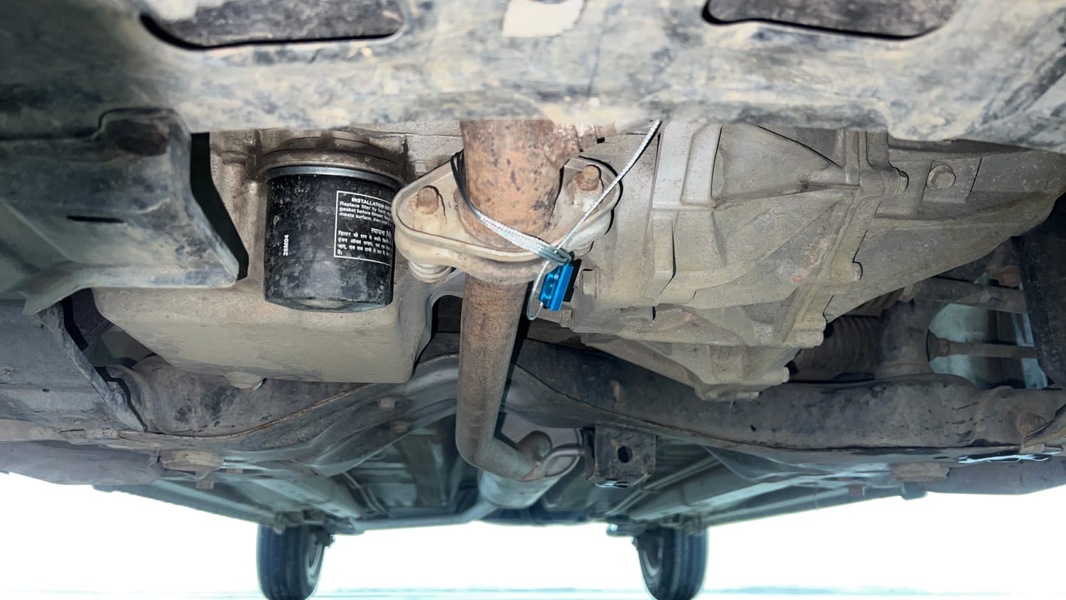 Used 2014 Maruti Suzuki Celerio VXi AMT Petrol Automatic extra FRONT LEFT UNDERBODY VIEW
