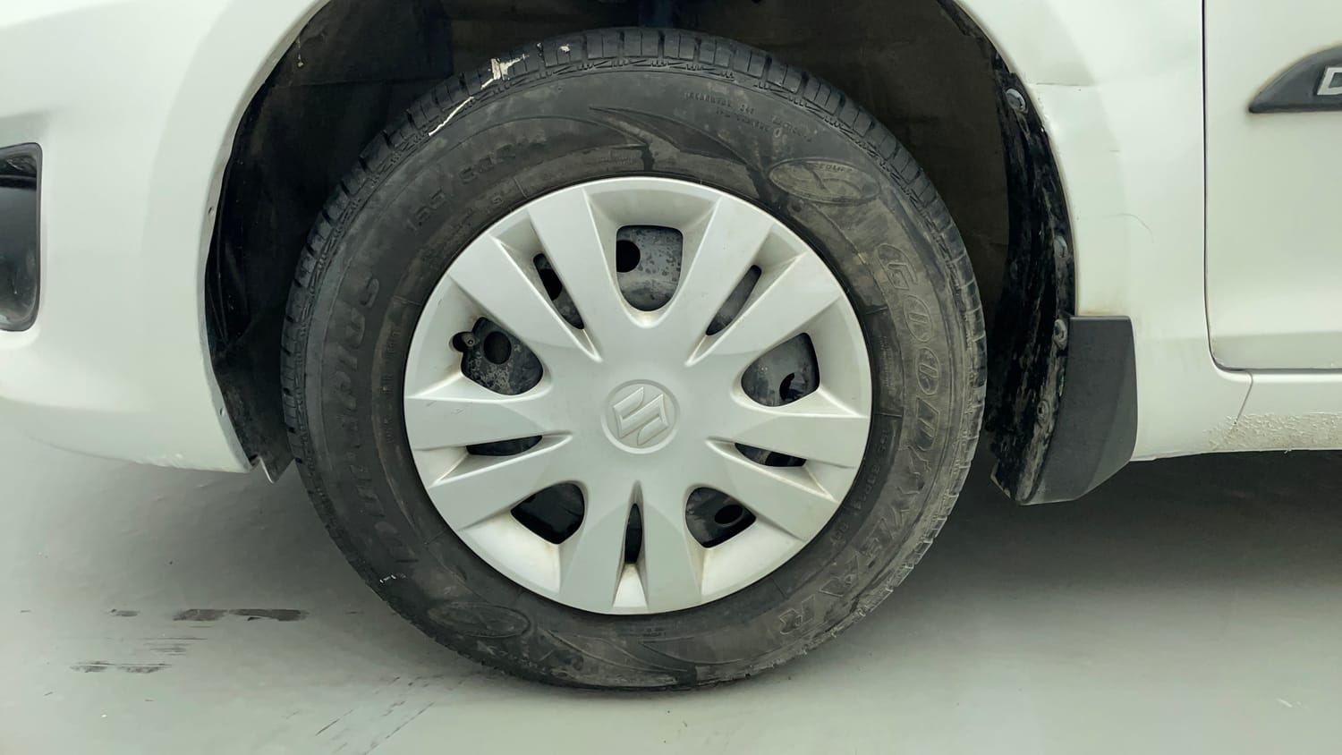 Used 2013 Maruti Suzuki Swift Dzire VXI Petrol Manual tyres LEFT FRONT TYRE RIM VIEW