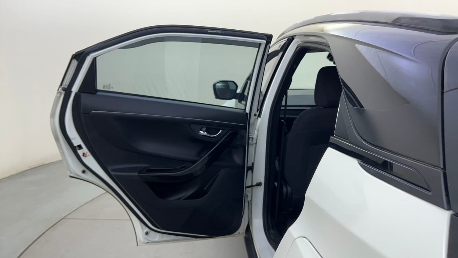 Used 2024 Tata Nexon Fearless 1.2 Revotron Petrol 6MT DT Petrol Manual interior LEFT REAR DOOR OPEN VIEW