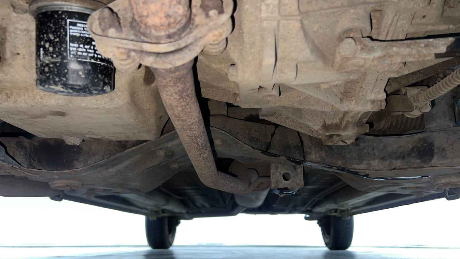 Used 2014 Maruti Suzuki Celerio VXi Petrol Manual extra FRONT LEFT UNDERBODY VIEW