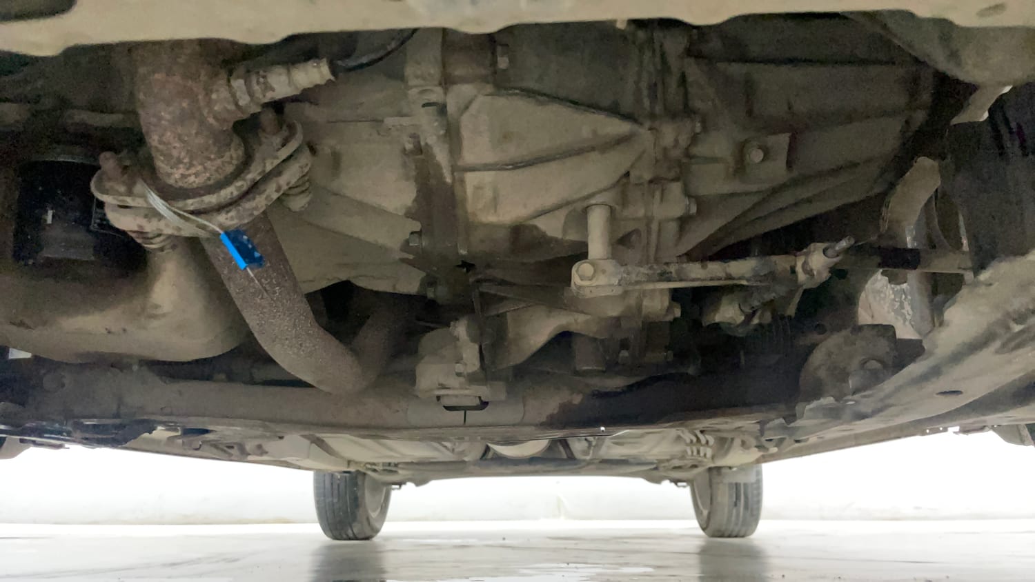 Used 2021 Maruti Suzuki Baleno Zeta Petrol Manual extra FRONT LEFT UNDERBODY VIEW