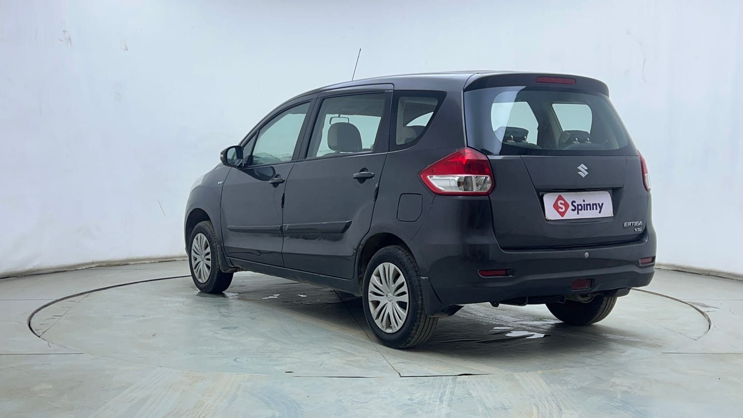 Used 2013 Maruti Suzuki Ertiga Vxi Petrol Manual exterior LEFT REAR CORNER VIEW
