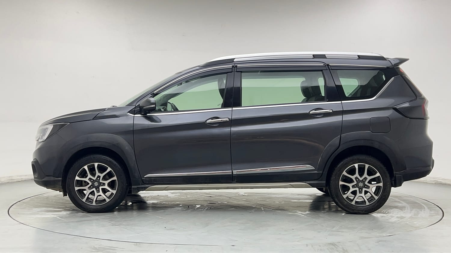 Used 2024 Maruti Suzuki XL6 Alpha AT Petrol Petrol Automatic exterior LEFT SIDE VIEW