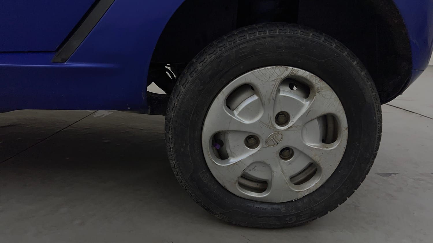 Used 2016 Tata Nano Twist XT Petrol Manual tyres LEFT REAR TYRE RIM VIEW