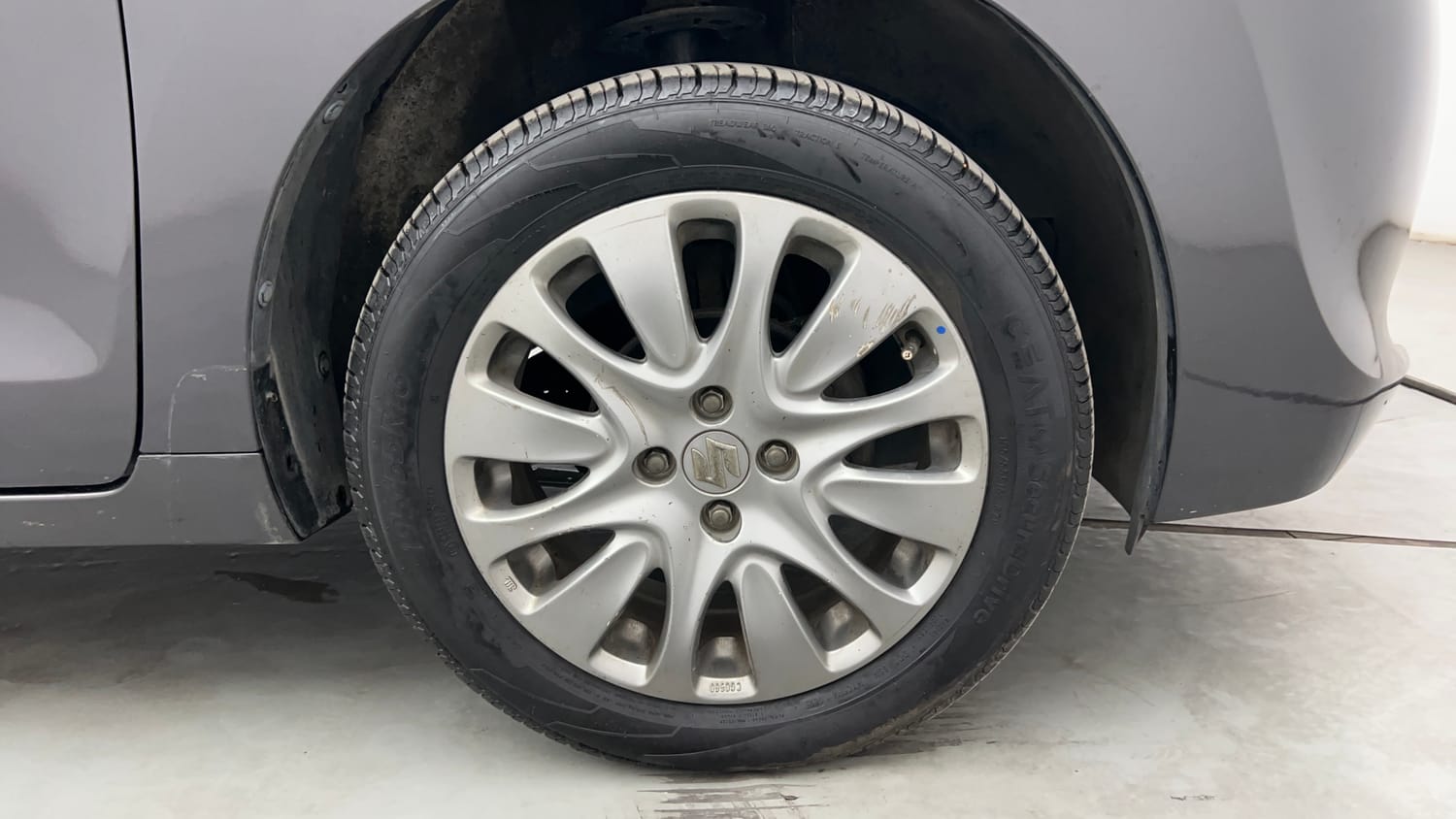 Used 2016 Maruti Suzuki Baleno Zeta 1.2 Petrol Manual tyres RIGHT FRONT TYRE RIM VIEW