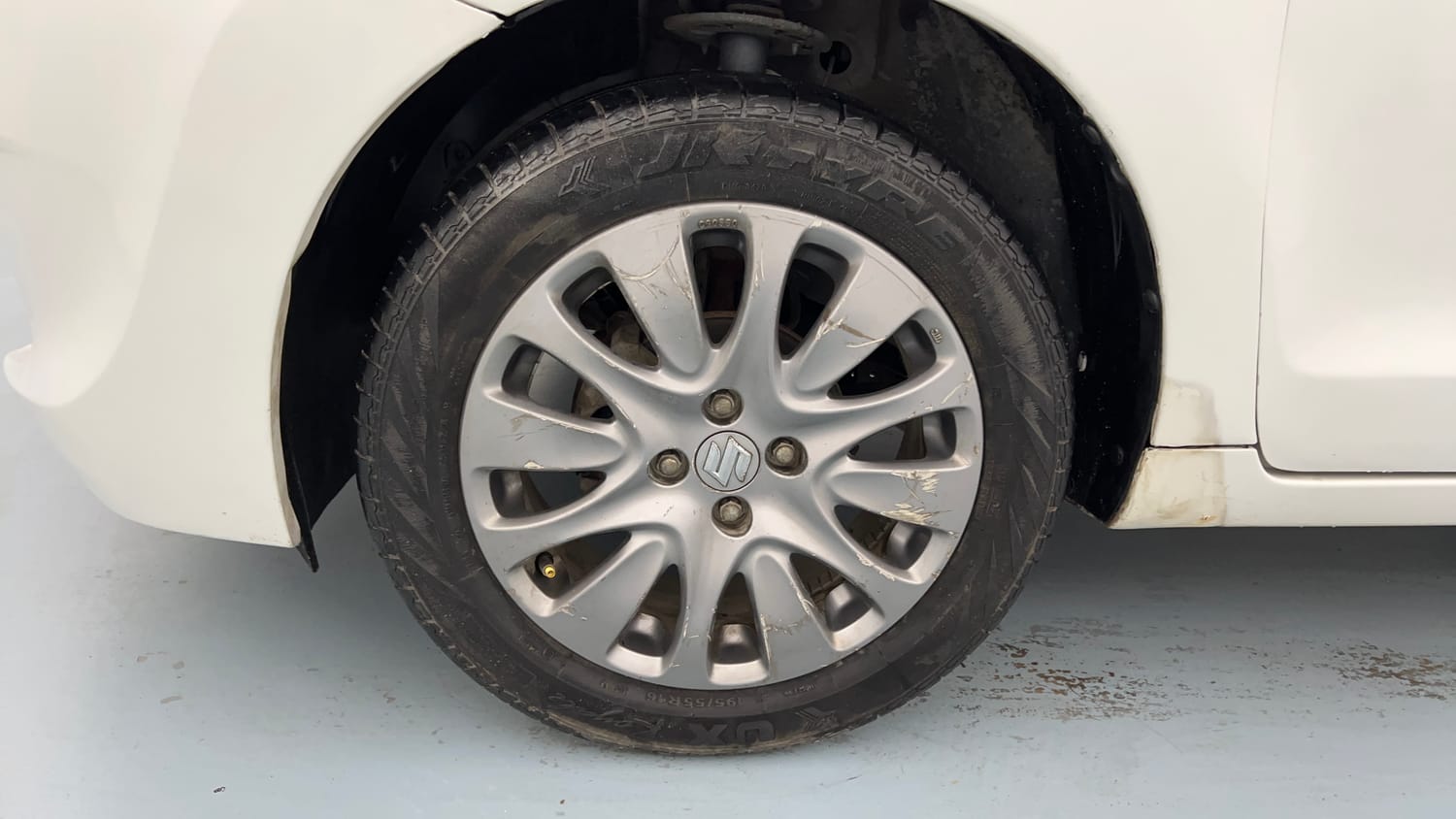 Used 2019 Maruti Suzuki Baleno Zeta 1.2 Petrol Manual tyres LEFT FRONT TYRE RIM VIEW