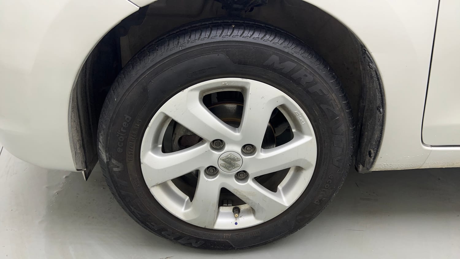 Used 2014 Maruti Suzuki Celerio VXi AMT Petrol Automatic tyres LEFT FRONT TYRE RIM VIEW