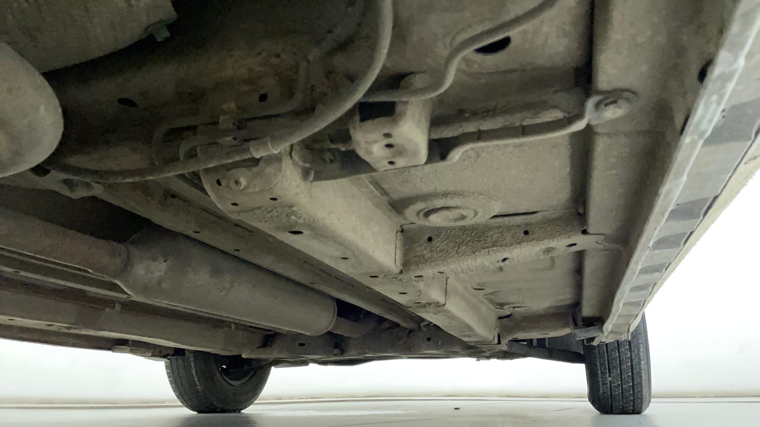 Used 2013 Maruti Suzuki Swift Dzire VXI Petrol Manual extra REAR RIGHT UNDERBODY VIEW