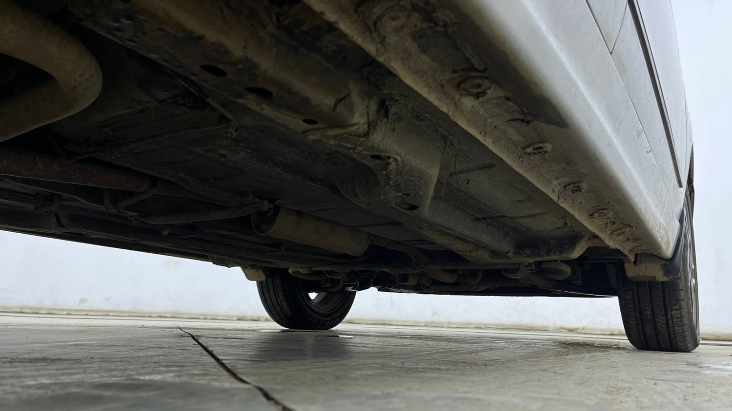 Used 2021 Tata Tigor XZ Plus Petrol Manual extra REAR RIGHT UNDERBODY VIEW