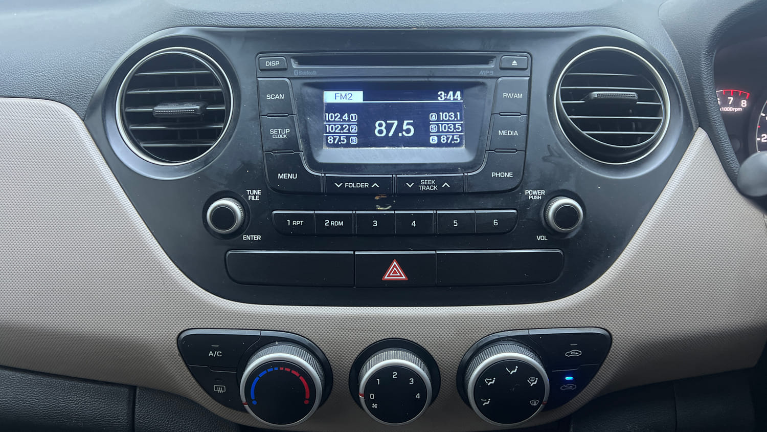 Used 2015 Hyundai Grand i10 Sportz 1.2 Kappa VTVT Petrol Manual interior MUSIC SYSTEM & AC CONTROL VIEW