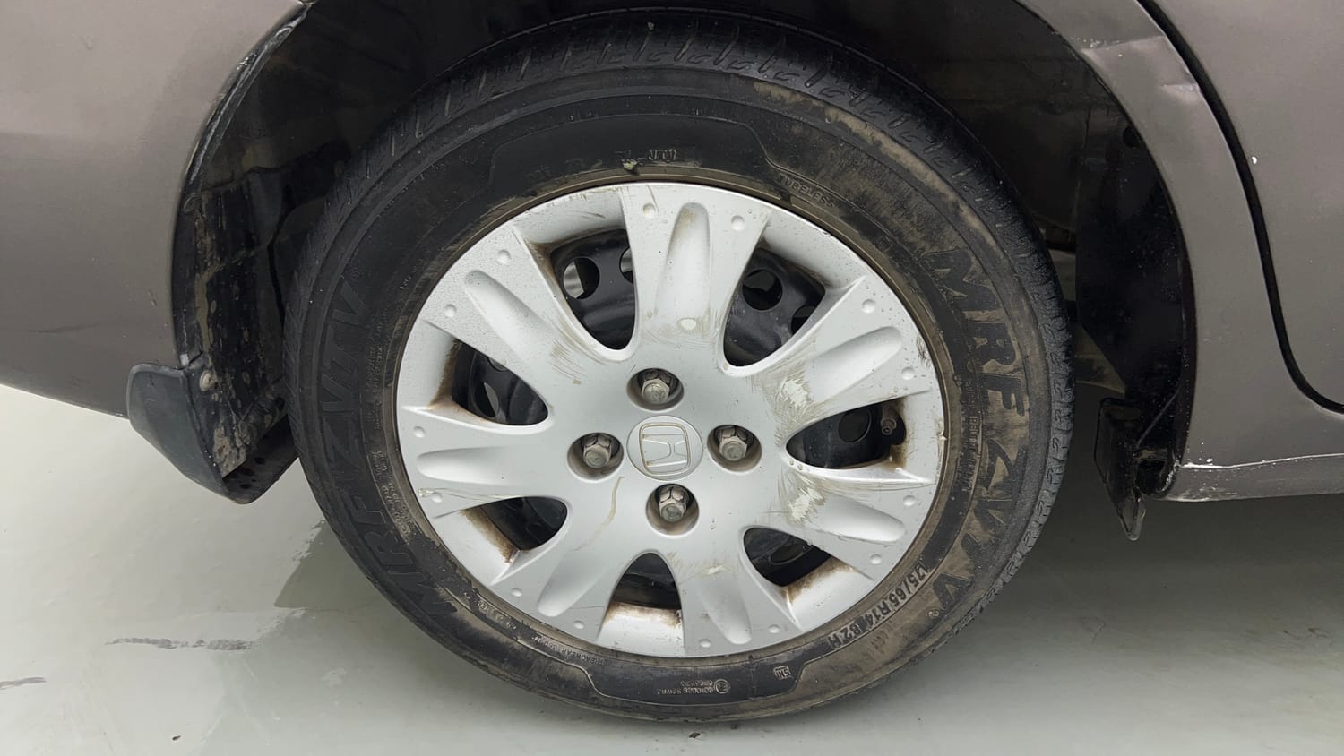 Used 2014 Honda Amaze 1.2 S i-VTEC Petrol Manual tyres RIGHT REAR TYRE RIM VIEW