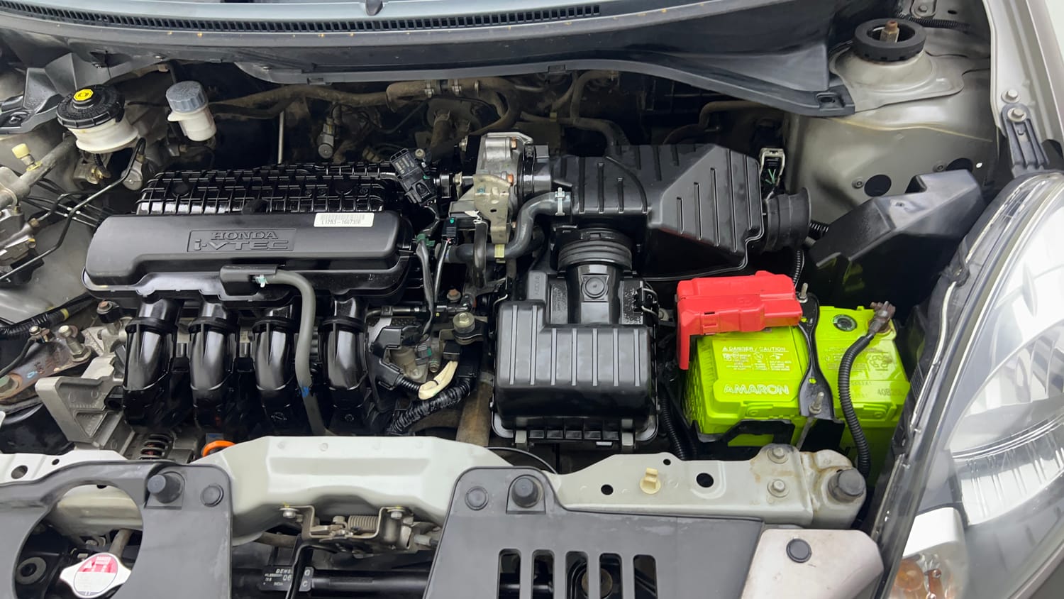 Used 2014 Honda Amaze 1.2 S i-VTEC Petrol Manual engine ENGINE LEFT SIDE VIEW
