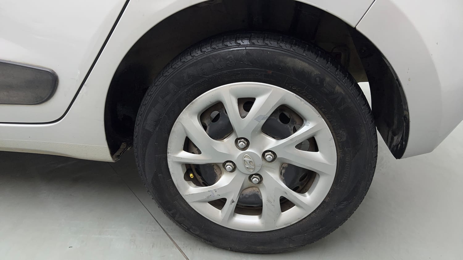 Used 2017 Hyundai Grand i10 Sportz 1.2 Kappa VTVT Petrol Manual tyres LEFT REAR TYRE RIM VIEW