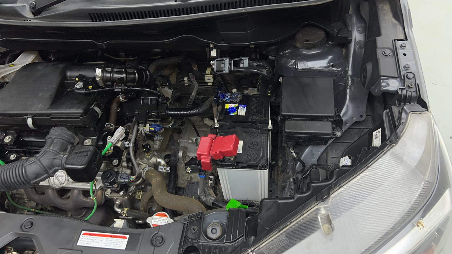 Used 2024 Maruti Suzuki XL6 Alpha AT Petrol Petrol Automatic engine ENGINE LEFT SIDE VIEW